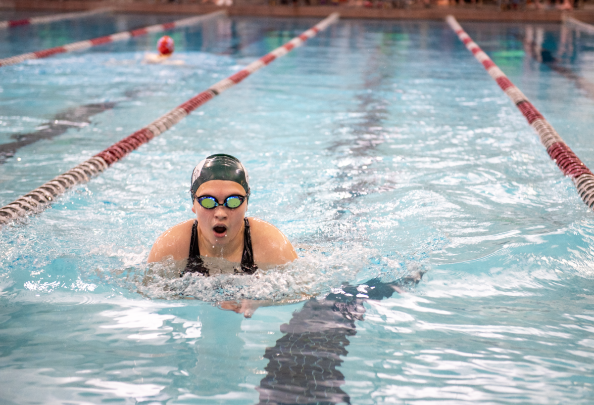 2.1.25 Freshman Harper Downing swimming breaststroke in the 200 IM at Missoula. 